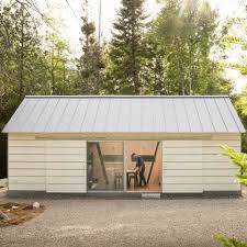 Storage, workshop you can easily drive your riding mower through the huge sliding doors, or just open them wide for plenty of light and ventilation. Maine Studio 30x40 Design Workshop Builds Own Home Office Cabin