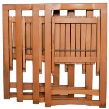 Check spelling or type a new query. Mid Century Modern Folding Carry Set Of 4 Slatted Wood Chairs Romania For Sale At 1stdibs