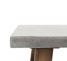 A round wooden top in darker browns has a metal rim. Buy Abbott Concrete Square Coffee Table Online Pottery Barn Uae