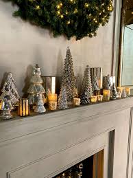 The christmas season also means cozy nights spent by the fire—which means your fireplace and mantel need to be decked out in the holiday spirit, too. Holiday Season Decorating Ideas Fireplace Mantels Eddie Zaratsian Lifestyle Design