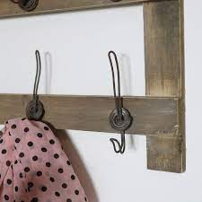 Included with this ledge are two metal brackets, one metal bar that holds five metal hooks. Rustic Wooden Wall Shelf With Hooks