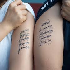 27 Lovely Matching Tattoos For Couples Bafbouf Matching Tattoos Matching Couple Tattoos Couple Tattoos