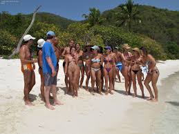 Naked embarrassed girl on the beach - hot summer surprise