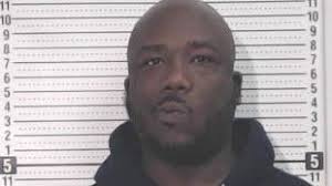 Earnest Moore turns himself in to police