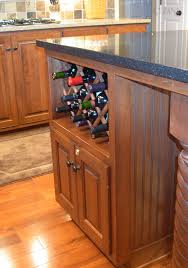 Its side planks are formed by the beautiful lattice that keeps the wine always in cool and ventilated condition. Other Accessories Gallery Zinn Kitchens