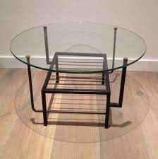 If you have a colour or style preference, use our filter and narrow down the options to find the perfect coffee table for your home. French Black Lacquered Metal And Brass Small Coffee Table With Round Glass Top In The Style Of Mathieu Mategot 1970s For Sale At Pamono