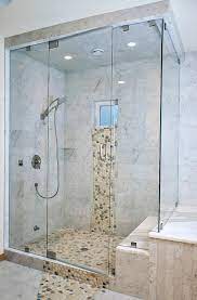 Small gutter system with rocks. Carrara Marble Shower With River Rock Pebbles Traditional Bathroom Seattle By All Tile Houzz