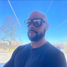 Who can level my side yard and plant grass in Vermilion Ohio?