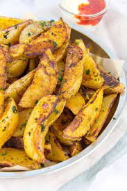 Homemade Seasoned Baked Potato Wedges Make And Takes Recipe Potato Wedges Baked Potato Wedges Spicy Recipes