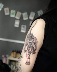 Tiger Tattoo By Tattooist Kimria Tattoodesigns Wrist Tattoos For Guys Tattoos For Guys Tiger Tattoo