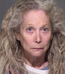 An ex-Phoenix police officer is facing 80 counts of animal cruelty after  more than 100 animals -- including alpacas and zebras -- were found at her  home. Police say the animal hoarding