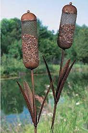 Feeders └ bird supplies └ pet supplies all categories antiques art automotive baby books business & industrial skip to page navigation. Amazon Com Cattail Bird Feeder Yard Stakes For The Birds Garden Stakes Garden Outdoor Metal Garden Art Bird Feeders Metal Yard Art