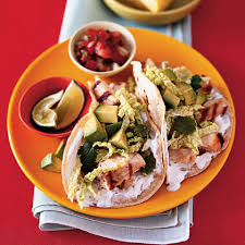 Cut fish in to chunks or strips in a gallon zip bag add all ingredients except for tortillas and toppings. Fish Tacos With Lime Cilantro Crema Recipe Myrecipes