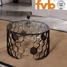 Crossed metal hairpin legs lend a spacious, mod feel to this coffee table. China 2019 New Design Modern Home Furniture Round Glass Coffee Table China End Table Tea Table