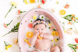 I think this would look equally as beautiful with a baby boy surrounded by blue and green flowers and greenery. Baby Milk Bath Session Kelly Kristine Photography Milk Bath Photography Baby Milk Bath Newborn Baby Girl Photography