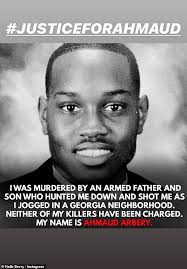 Family of black jogger, 25, shot and killed by two white men demand justice 