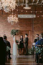 Rustic Industrial Wedding At The Commons Calgary Junebug Weddings Brick Wedding Venue Industrial Wedding Calgary Wedding Venues