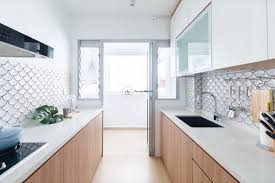 This minimalist galley kitchen design is an excellent choice for those spaces that are narrow and long. 8 Interior Design Trends In Singapore That Might Take Off In 2020 Kitchen Layout Galley Kitchens Kitchen Interior