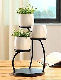Va Plac Florile In Ghivece Priviti Aici 20 De Idei Practice De Suporturi Pentru Ele Plantes De Decor De Maison Deco Plantes Interieur Etagere Jardin