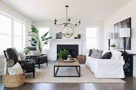 The Family Room Is A Nice Size With Lots Of Large Windows And Shiplap To Clad The Fireplace Wall Farm House Living Room Living Room Remodel Simple Living Room