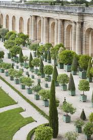 The range of distinct versaille planters — often made from metal, hardwood and wood — can elevate any home. The History Of Versailles Citrus Planter Boxes Eye Of The Day Garden Design Center