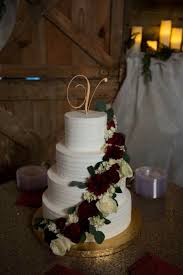 Wedding Cake By Rick S Bakery Fayetteville Arkansas Simple Cake Burgundy Flower Cascade Cake Wedding Cakes Golden Wedding Cake Beautiful Wedding Cakes
