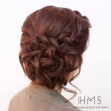 Bridesmaid's updo with fantastic floral accessories. 24 Beautiful Bridesmaid Hairstyles For Any Wedding The Goddess