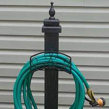 How To Make Your Own Holder For Garden Hose Storage Hose Storage Garden Hose Holder Garden Hose Storage