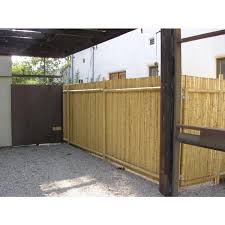 Fencing is just what you need to bring the tropics home, both indoors and outside. Backyard X Scapes 1 In D X 6 Ft H X 8 Ft W Natural Rolled Bamboo Fence Hdd Bf05 The Home Depot Bamboo Fence Garden Fence Panels Backyard Fences