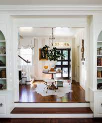 Beautiful Entrance Foyer By Anne Wagoner Interiors White Plaster Urn Filled With Greenery On A Center Table Annewagonerin Classic Home Decor Home Home Decor