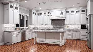 The mint green cabinets add a touch of whimsy to the kitchen, while the white overhead cabinets keep it looking fresh. Brazos White Kitchen Cabinets Rta Cabinet Store