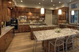 Dark wood cabinets with tan kitchen countertops. Delicatus Brown Granite Kitchen Countertops Medium Dark Cabinets Kitchen Design Countertops Brown Granite Countertops Granite Countertops Kitchen
