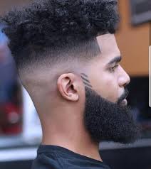This style accentuates natural curly hair that is presented in a decent frame. Top 30 Cool Fade Haircut Black Men Stylish Fade Haircut For Black Men