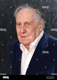 Frederick Forsyth arriving Stock Photo