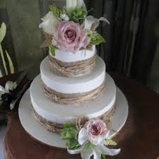 Artificial flowers are not only easier to attach because they are so light weight, they can also be placed well in advance, with out the fear of wilting flowers or damaging the icing. Cake Flowers Keepsake Bouquets