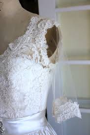 A satin and lace short wedding gown and a wedding in a museum. Diy Lace Wedding Dress Fashion Dresses