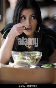 Kim Kardashian and sisters Khloe and Kourtney enjoy a meal at Toast. After  eating, the girls touch up their makeup before heading to the Hillary Rush  boutique for a bit of shopping.