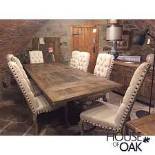 Custom made dining room table with two benches, made from reclaimed wood. Hudson Bay Reclaimed Elm Large Extending Table House Of Oak