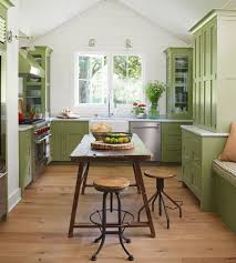 Better Homes Gardens On Instagram This Apple Green Kitchen Is Making Us Green With Envy The Con Green Kitchen Cabinets Country Kitchen Cottage Kitchens