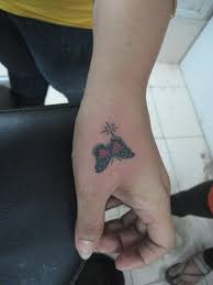 Black stars and butterfly tattoo. Small Butterfly Tattoo On Side Wrist Novocom Top