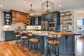 Refacing kitchen cabinets entails reusing your existing cabinet boxes and frames while replacing the cabinet doors and drawer fronts. Are Blue Green Kitchen Cabinets Pushing Aside White Jim Mills Group