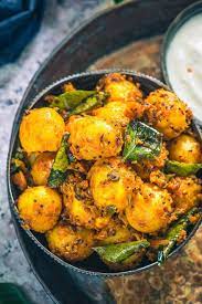 Bombay Potato Is A Popular Dish Made Using Baby Potatoes And Indian Masalas Popular Bombay Potato Recipe Indian Potato Recipes Indian Food Recipes Vegetarian