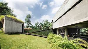 House tour through a triangle! Andra Matin Carves Out Hills And Caverns For His Second Home In Bintaro Jaya Bluprint
