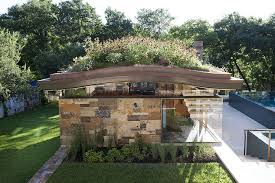 Blockbusters doesn't matter if it's a medical technology campus, a residence, a housing project, or a public facility. Pool House With A Curved Living Roof Makes A Bold Green Statement