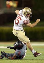 Nick Oleary 35 Of The Florida State Seminoles The Ball In The Second Half Against The Louisville Card Fsu Football Florida State Seminoles Seminoles Football