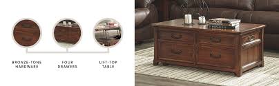 Getting the best has always been and will remain a significant challenge for most people. Amazon Com Signature Design By Ashley Woodboro Lift Top Cocktail Table Dark Brown Finish Furniture Decor