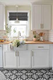 When designing a less architecturally distinct kitchen, we love incorporating color for cabinets, dark accents, textures like white oak, and contrasting island colors, they say. 40 Elegant Black And White Floor Tile For Your Kitchen Design White Kitchen Tiles White Tile Floor Kitchen Flooring