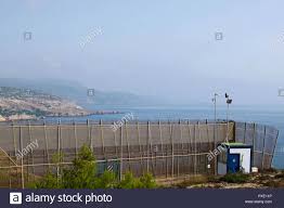 The city has a tax free status making it particularly interesting to those in industry who can use it as a base; Ceuta Melilla Spanien 13 Aug 2018 Eine Stark Befestigte Dreistufige Zaun Spanien Trennt Sich Von Marokko