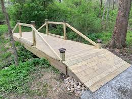 It is the perfect garden bridge plan to go over a small water feature. First Time Woods Creek Bridge Build Woodworking