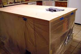 Rub the linseed oil into the wood while moving the wiping cloth in the direction of the wood grain. How To Stain And Waterproof A Wood Countertop Home On 129 Acres